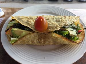 Avocado, mushroom, aubergine, pesto chickpea wrap at Como En Mi Casa in Puerto Viejo De Talamanca