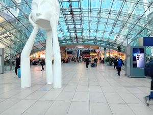 Haferkater is on the right, next to the "The Squaire West" sign. at FRA - Haferkater in Frankfurt