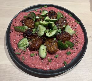 Baked potatoes with bean and beet saucee  at Colibri in Vilnius