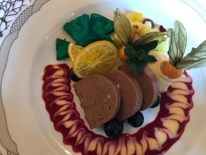 Dessert with homemade chocolate parfait, blue pineapple slices and  fruit salad. at Knittel's Restaurant Kreuzberg in Tubingen