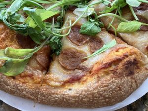 One of their frozen pizzas, with arugula added at home    at Erbe Farms in St Charles