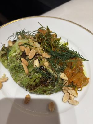 Choux grillé, cacahouètes grillées dans l’huile d’olive, salade kimchi  at Noah in Krakow