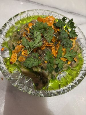 Aubergine grillée, tahini, amandes grillées à l’harissa  at Noah in Krakow