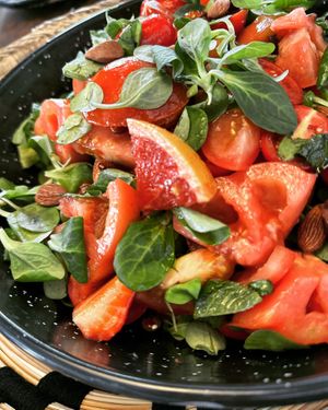 Summer salad ; tomatoes + red grapefruit + watermelon + fresh basil  at Mondo Mediterraneo in Amsterdam
