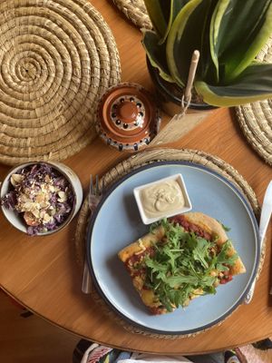 Homemade pizza, chickpea mayo, slaw with red cabbage and smoked tofu- delish  at Folks Cafe in Edinburgh