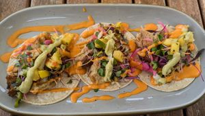 Blackbird Foods seitan tacos, pickled red onion, micro greens, spicy creamy salsa roja, grilled pineapple jalapeno pico, and avocado dressing. at Vibrissa Beer  in Winchester