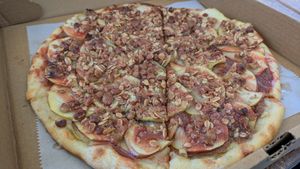 Dessert apple pizza on house made sourdough crust. at Vibrissa Beer  in Winchester