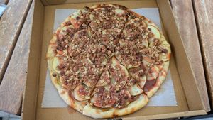 Dessert apple pizza on house made sourdough crust. at Vibrissa Beer  in Winchester