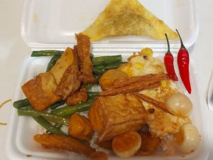 Various mock meats over rice at Thiện Ân in Ho Chi Minh City