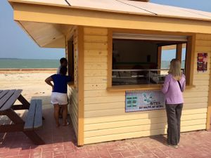 on the ocean side of BTL park at Vegan Bites in Belize City
