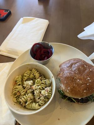 House burger and pesto pasta  at Veggie Grill by Next Level in Carlsbad