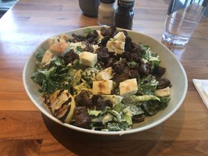 Classic Cesar Salad with grilled vegan beef protein.   at Veggie Grill by Next Level in Carlsbad