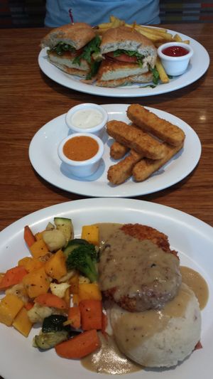 Buffalo Bomber sandwich, Chill Out wings, Crispy Chicken plate at Veggie Grill by Next Level in Carlsbad