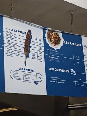 Menu inside at Kanisos in Uccle