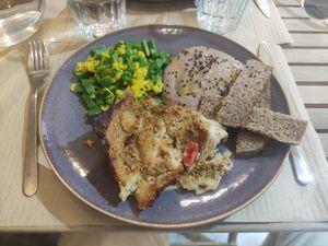 Chucrut, hummus de alubias rojas y lasaña at Luz & Tierra in Malaga