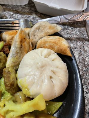 Steamed bun and dumplings - tasted just as delicious as we hoped!  at Happy Veggie House in Calgary
