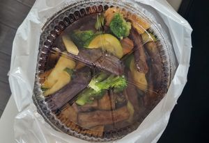 Eggplant and tofu to go. at Happy Veggie House in Calgary