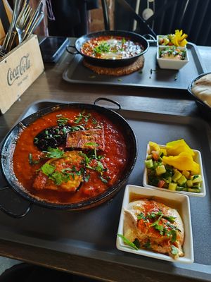 Vegan shakshuka with grilled eggplant, hummus and pickles at Paprika in Prague