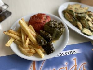 Stuffed tomato, pepper and vine leaves with fries - Taverna Neraida, Lake Kournas  at Taverna Neraida  in Crete