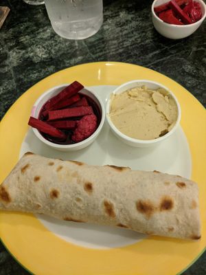 Falafel wrap with hummus and pickles at Cafe Turtle in New Delhi