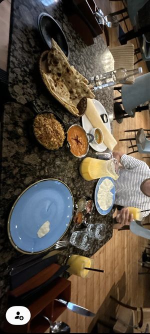 Butter chicken, biriyani, various naans and popadoms   at Sarthi in Bath