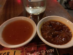 Extra sauces: sweet chili (L) and homemade chili paste (R)  at Banana Tree - Wardour in London