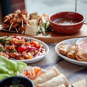 Vegan satay sticks, vegan dumplings, vegan spring rolls, sweet and sour vegan bites, at Banana Tree - Wardour in London