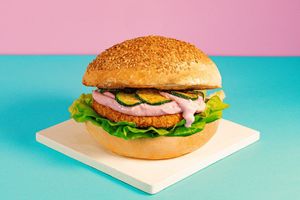 Green Bun: Cornflake-crusted spicy veg Cutlet, Lettuce, Beetroot plant-based Feta Sauce, Scapece-style Zucchini, Green Olive Patè at Green M'ama  in Rome