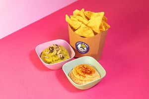 Green Hummus: Pea, Bean and Mint Hummus with black Sesame seeds and corn Nachos

Classic Hummus: Chickpea Hummus with chives and corn Nachos at Green M'ama  in Rome