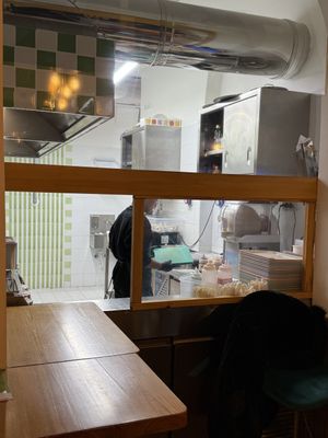 Kitchen behind   at Green M'ama  in Rome