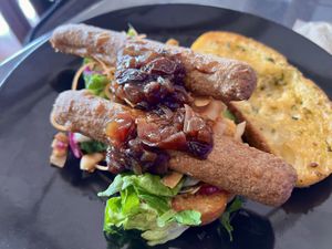 Vegan sausage & bacon sandwich  at The Bach on Surf Highway in Oakura