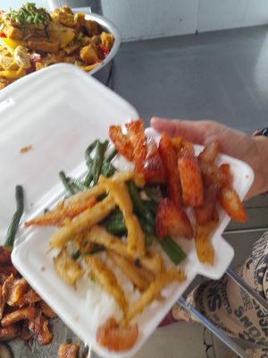 My vegan food getting prepared for take away at Cơm Chay Việt in Ho Chi Minh City