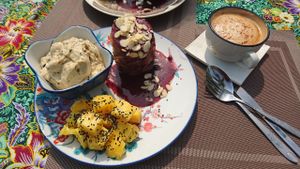 Pancake stack with peanut butter chocolate chip banana ice cream and pineapple.  at DAO of Life in Sihanoukville