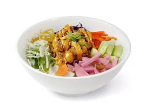 Plant-based chicken rice bowl with citrus cabbage, edamame, pickled onion, fermented bean sprouts, pickled daikon, cucumber, and vegan gochujang aioli.  at Food on the Fly in Minneapolis