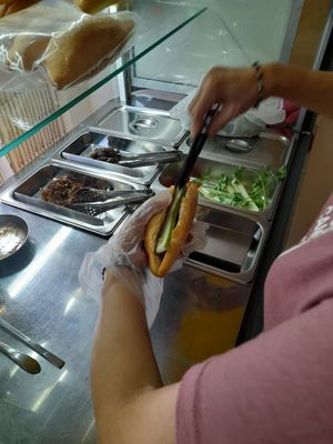 Preparing my take away vegan food at Jōn Bánh Mi Chay Dây in Ho Chi Minh City