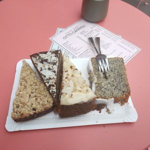 From left: plum crumble, courgette and chocolate cake, carrot and walnut cake, lemon and poppyseed cake at Otto Cannoli in Cologne