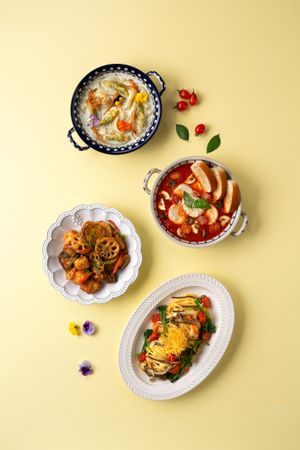 Main Dishes : A variety of signature meals including creamy tteokbokki, pasta dishes, curry, bibimbap, and noodles.,  at Plantude - Godeok  in Seoul
