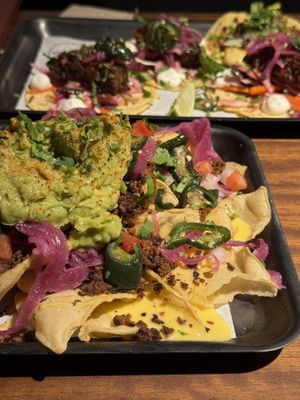Loaded nachos and tacos  at Club Mexicana - Boxhall City in London