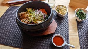 비빔밥 Bibimbap (without egg) and two added side dishes at Kims Kimchi in Bochum