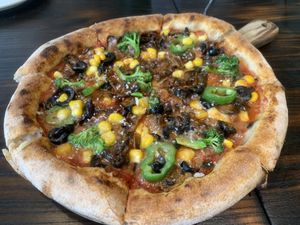 Garden olive pizzaa  at  YEELEN COOK - YEELEN·COOK·意庐夕餐 (大理大学店) in Dali