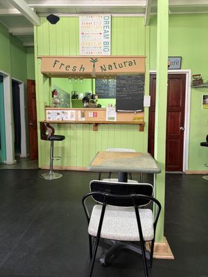 This is located inside a very nice clothing store  at Fresh and Natural Cafe in Roseau