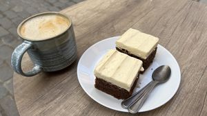 Oat latte and morotskaka (carrotcake).  at Bacchi Syre  in Stockholm