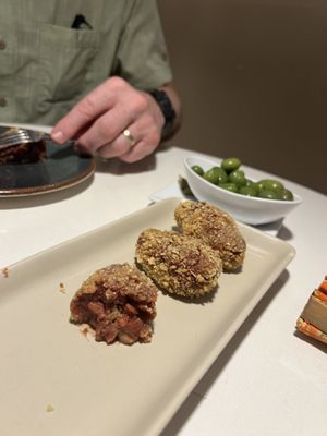Beet croquettes and olivess before  at PÖTSTOT in Barcelona