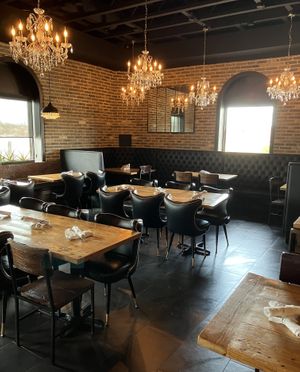  at Curiouser Coffee and Conservatory in Apple Valley