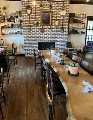  at Curiouser Coffee and Conservatory in Apple Valley