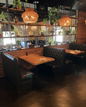  at Curiouser Coffee and Conservatory in Apple Valley