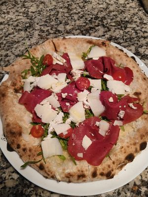 Pizza Parma at Swami's Garden in Praia Da Luz