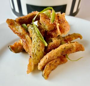 Crispy pickle fries  at Chamo in Dubai