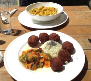 curry noodles and falafel with rice and vegetables at O Elefante in Santiago De Compostela