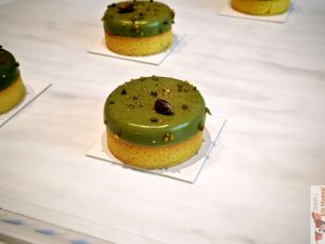 

Almond shortbread, clementine sponge cake, Corsican clementine gel, pistachio cream, pistachio mousse and pistachio glaze at Les Artizans - Coffee And Flower in Paris